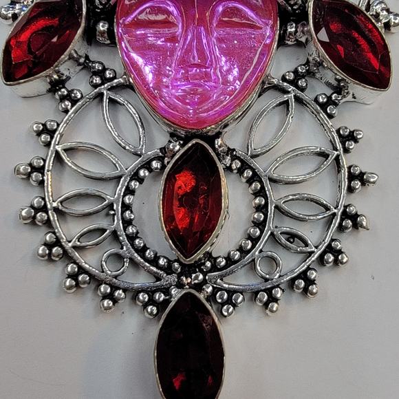 Sterling Silver Pendant with Pink Carved Face and Garnet Accents - Picture 4 of 10